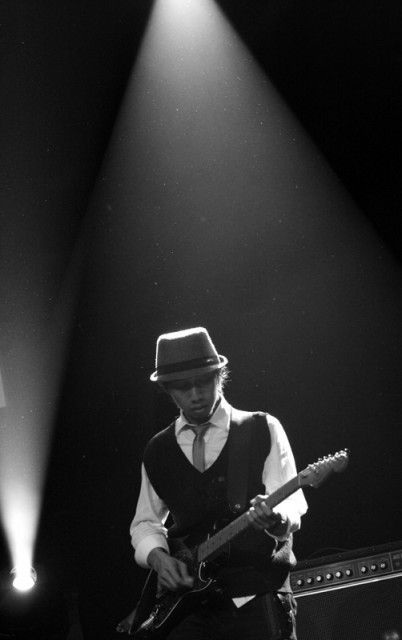 strumming beneath the light...